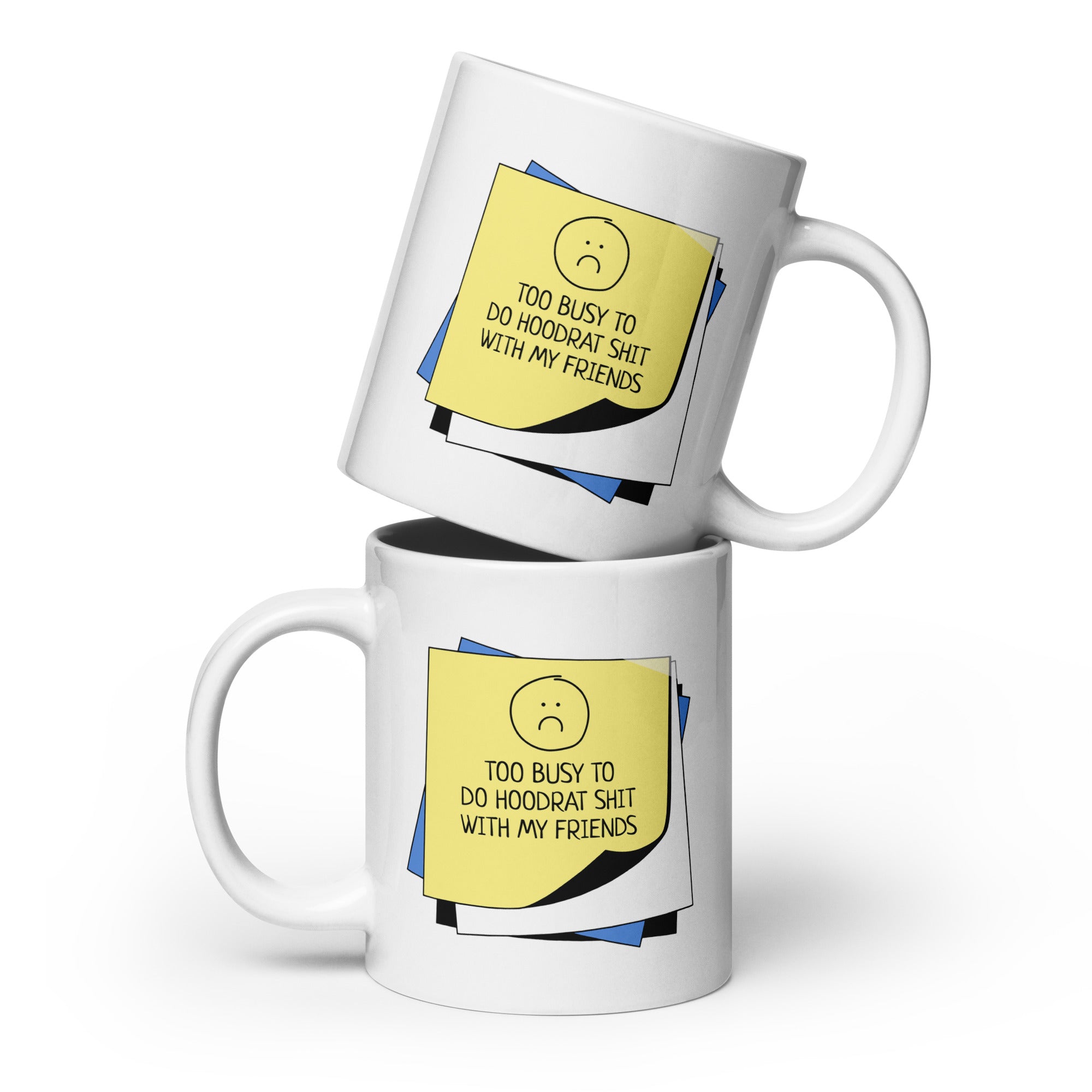 Two white coffee mugs with an illustration of a stack of Post-It notes with the caption, "Too busy to do hoodrat shit with my friends".			

